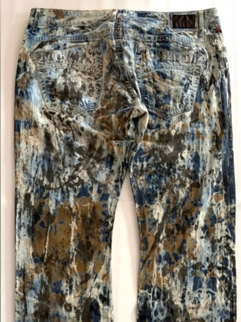 Robin’s Jean Denim Paint Splatter Print
Sty#D547 1IND Marlon Straight Studs 42